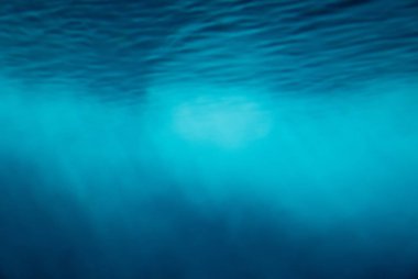 Sualtı ışık ray arka plan kirişler.