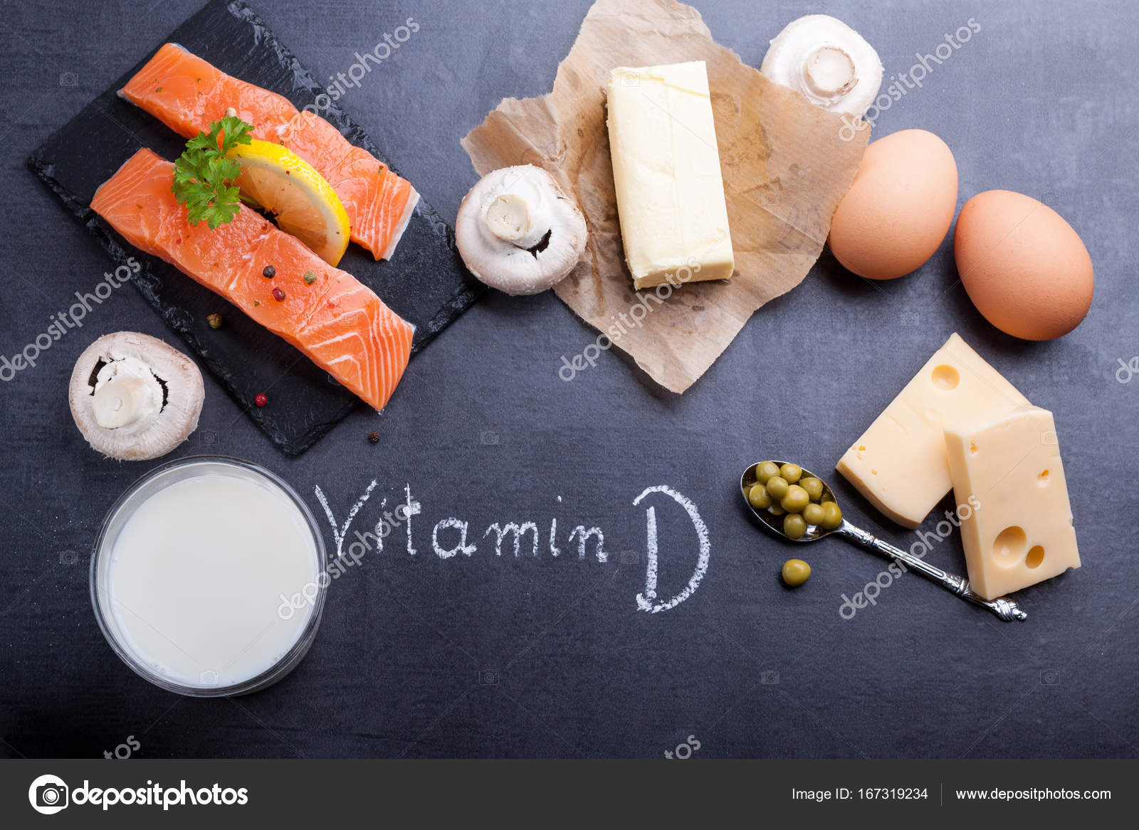 Black slate table with product rich in omega 3 and vitamin D. Stock