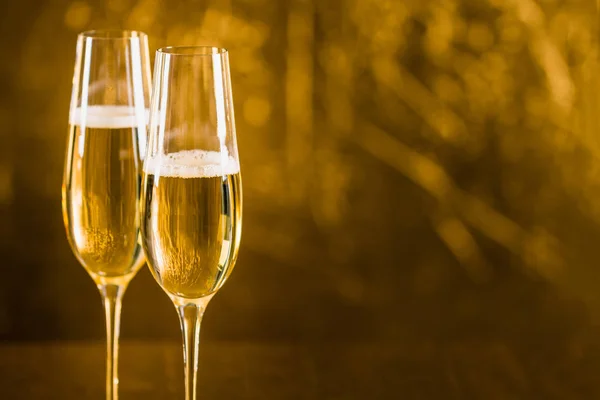 Two Glasses Champagne Golden Tone Copy Space — Stock Photo, Image