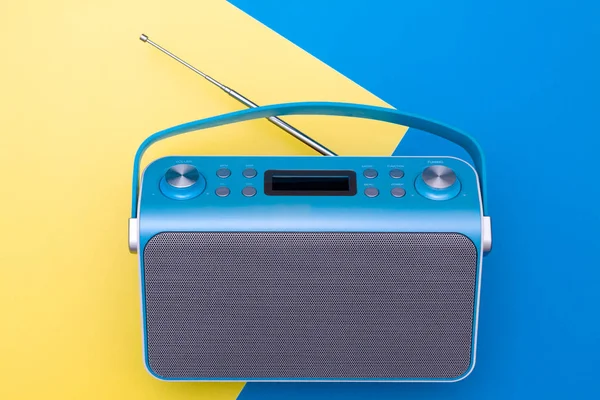 Top view on new digital blue radio,which it is stylized art retro style radio.