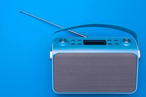 Top view on new digital blue radio,which it is stylized art retro style radio.