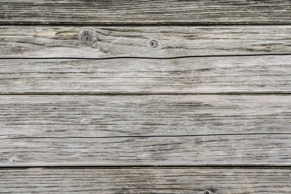 eski soluk gri ahşap tahta ile çatlak ve deniz mili