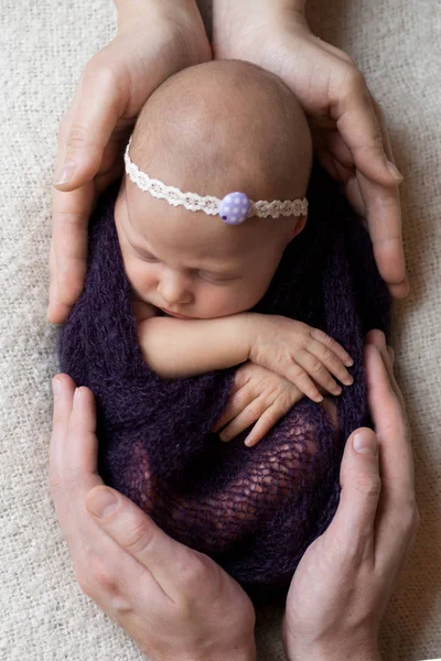 Parents holding sleeping  newborn baby — Stock Photo, Image