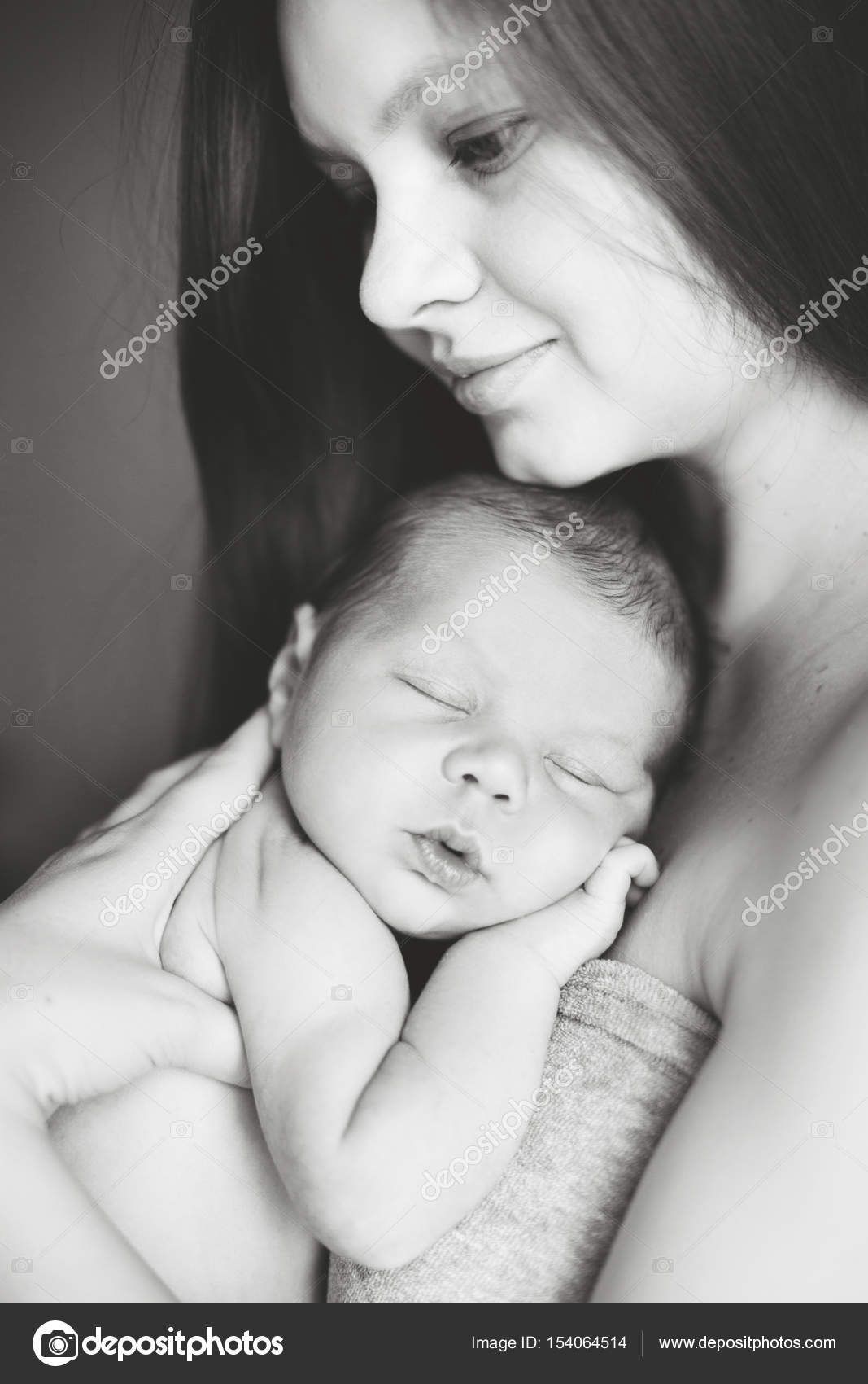 Mother holding sleeping newborn son Stock Photo by ©funfamilyfoto ...
