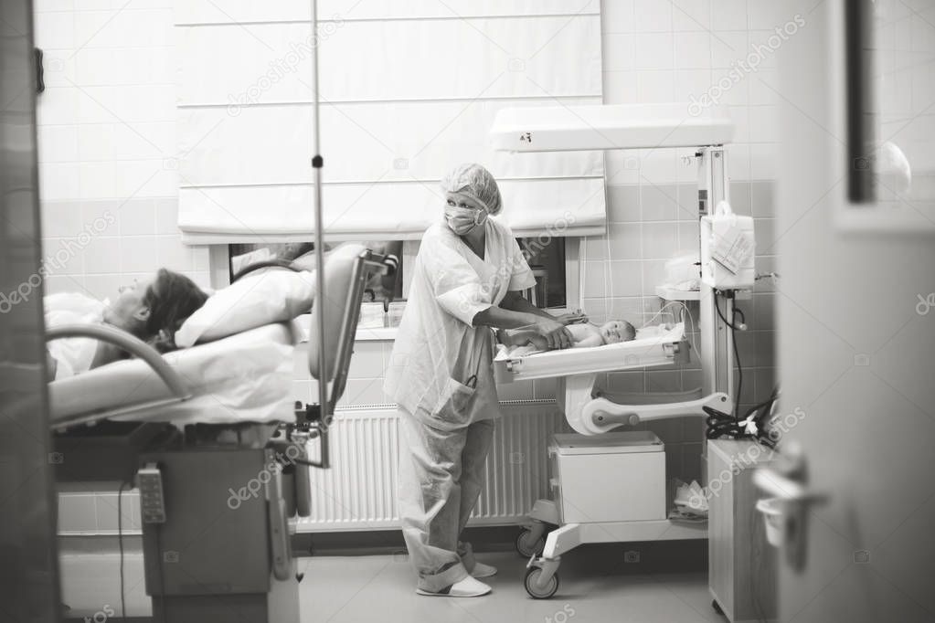 mother,doctor and newborn in the hospital ward