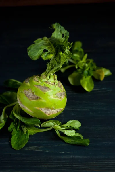 Local food from countryside. Fresh cabbage kohlrabi lies on the table.