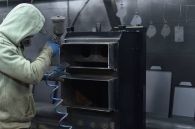 Adam lehimler siyah katı yakıtlı kazan