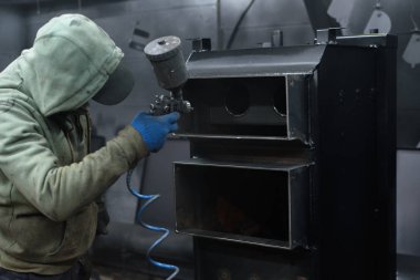 Adam boya katı yakıtlı kazan siyah renkli