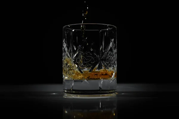 Empty glass in which poured Scotch — Stock Photo, Image