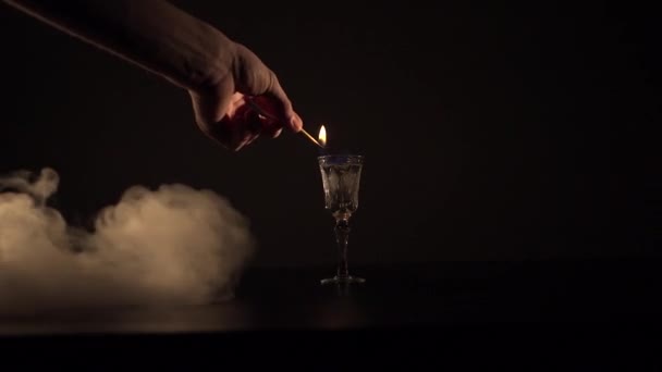 Burned alcohol drink and streams of smoke — Stock Video