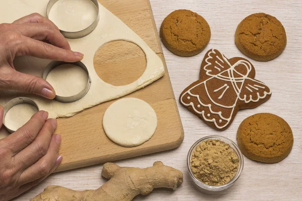 Dough for baking ginger cookies on a cutting board, cookie cutter