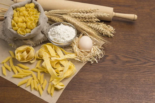 Organic food. Durum wheat pasta.  Eggs and flour, rolling pin