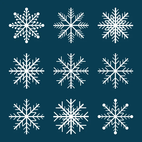 Conjunto de flocos de neve no fundo azul. Ilustração vetorial — Vetor de Stock