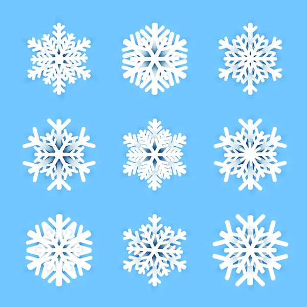 Flocos de neve de papel no fundo azul. Ilustração vetorial — Vetor de Stock