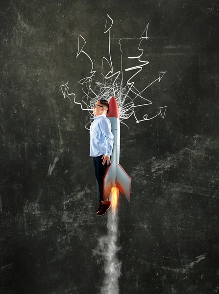 Businessman flying with rocket missle in front of blackboard. Blackboard drawn with arrows .