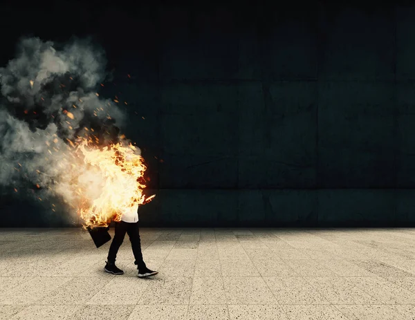 Burning businessman going to work . Life insurance concept . Work assurance . Careless worker going to work while on fire .