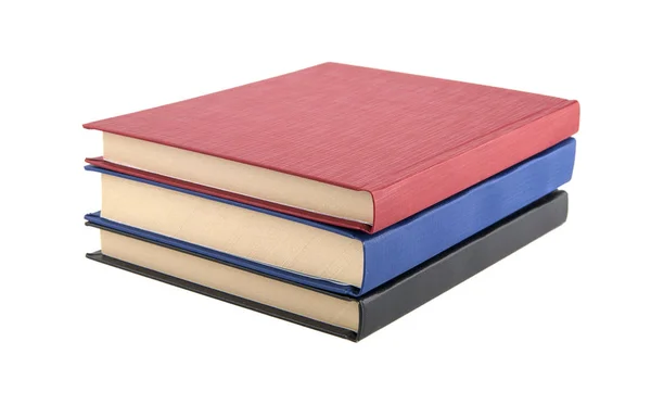 beyaz zemin üzerinde üç kitap