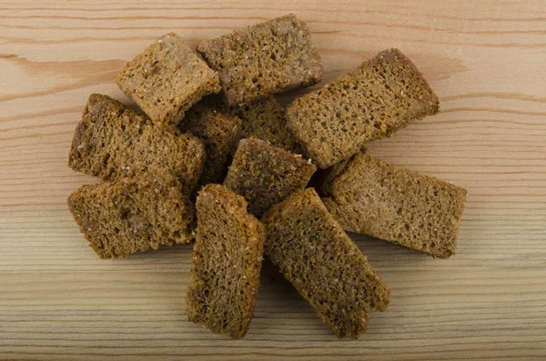 Žitné sušenky na dřevěné pozadí — Stock fotografie