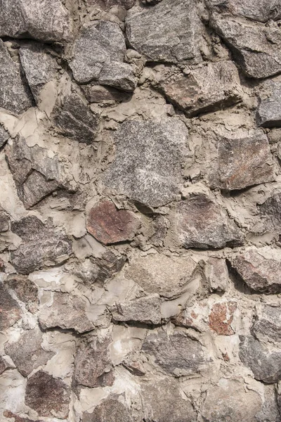 Muur van steen close-up als achtergrond — Stockfoto