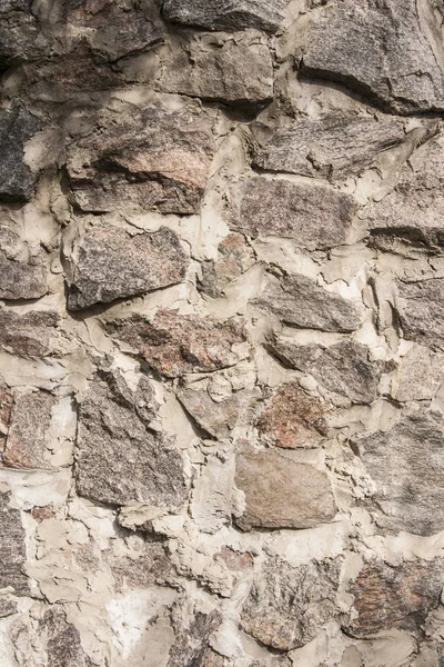 Muur van steen close-up als achtergrond — Stockfoto