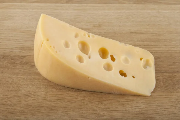 Cheese on a wooden background — Stock Photo, Image