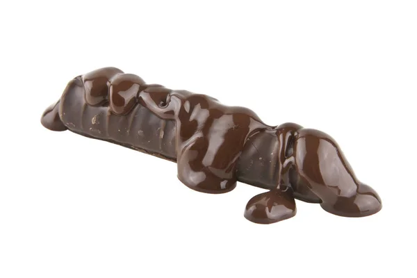 Čokoladové bonbony v tekuté čokolády pozadí — Stock fotografie