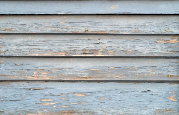 Light blue gray row painted plank peeling paint — Stock Photo, Image