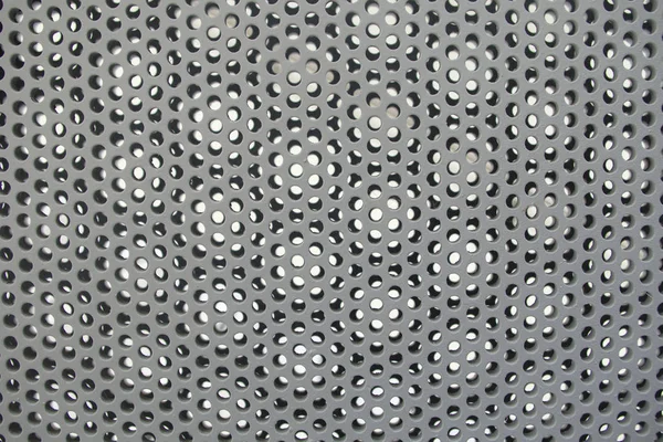 Cercles grille métallique texture grise acier perforé motif de trous — Photo