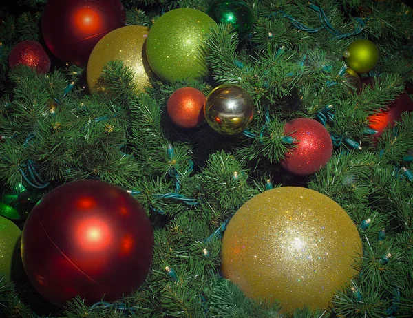 Christmas tree bright decorations close-up detail balls hanging in fir — Stock Photo, Image