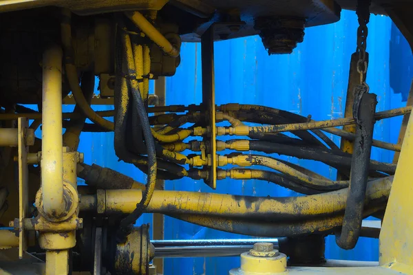 Motor Tıkaçları Sarı Inşaat Makinesi Motor Parçalarını Kapat — Stok fotoğraf