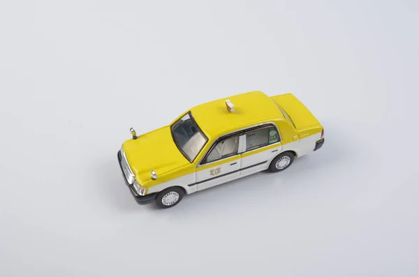 Küçük bir oyuncak taksi Japonya — Stok fotoğraf