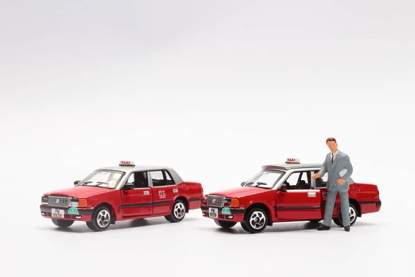 Model taxi i figurki — Zdjęcie stockowe