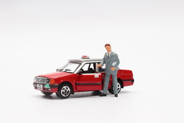 Model taxi i figurki — Zdjęcie stockowe