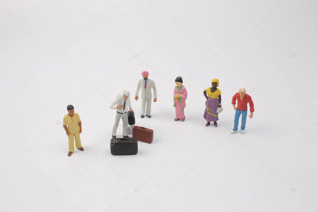 Miniature backpacker and tourist people 