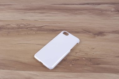 Ahşap arka plan akıllı telefon için durum