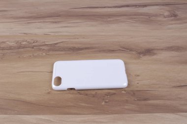 Ahşap arka plan akıllı telefon için durum