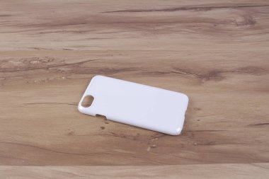 Ahşap arka plan akıllı telefon için durum