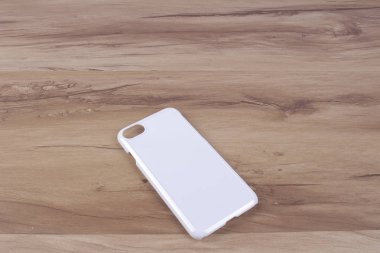 Ahşap arka plan akıllı telefon için durum