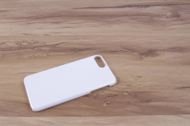 Ahşap arka plan akıllı telefon için durum