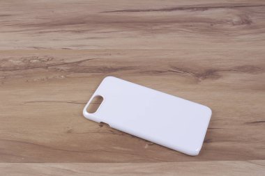 Ahşap arka plan akıllı telefon için durum