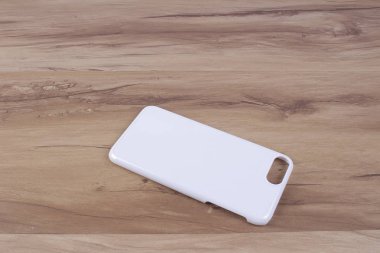 Ahşap arka plan akıllı telefon için durum