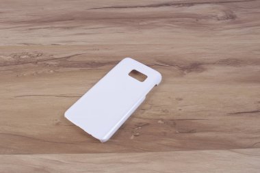 Ahşap arka plan akıllı telefon için durum