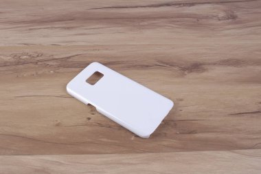 Ahşap arka plan akıllı telefon için durum