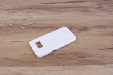 Ahşap arka plan akıllı telefon için durum