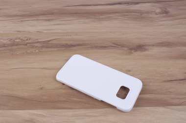 Ahşap arka plan akıllı telefon için durum