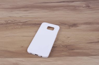 Ahşap arka plan akıllı telefon için durum