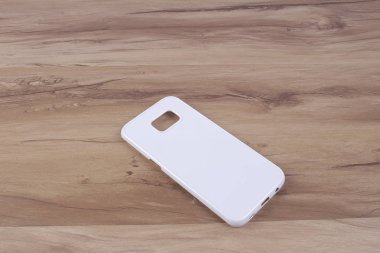 Ahşap arka plan akıllı telefon için durum