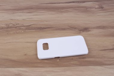 Ahşap arka plan akıllı telefon için durum