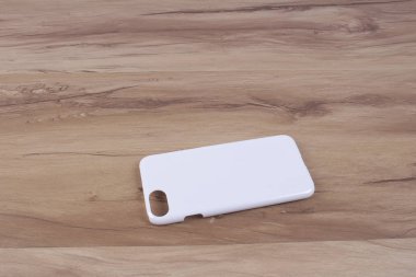 Ahşap arka plan akıllı telefon için durum