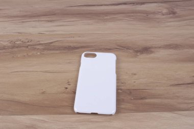 Ahşap arka plan akıllı telefon için durum